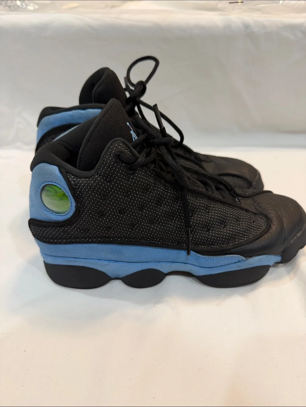 Jordan Men's Black and University Blue Retro Sneakers